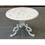 A cast iron garden table, possibly Coalbrookdale. Diam. 58cm H42cm.