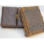 Two Victorian photograph albums. Condition - worn.