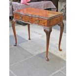 A 1950s burr walnut two drawer side table in the manner of Epstein. W96cm D50cm H78cm.