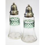 A pair of hallmarked silver mounted and cut glass sugar castors, height 17cm each.