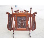 A carved mahogany fire screen circa 1900. L79cm.