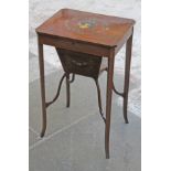 An Edwardian inlaid mahogany sewing or work table with hand painted portrait and floral