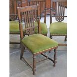 A set of four oak dining chairs circa 1920. H97cm.