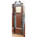 A Georgian oak long case clock the silvered brass dial inscribed 'Coates Wigan'. H222cm.