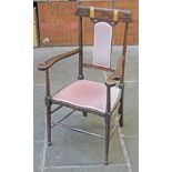 An Edwardian Art Nouveau style armchair with mother of pearl inlay. H98cm.