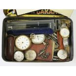 A tin and contents to include pocket watches, pens etc.