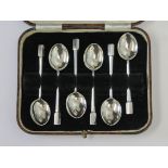 A cased set of six hallmark silver tea spoons.