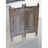 An Edwardian two part screen with Art Nouveau strap hinges. H75cm.