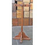 A pitch pine hat and coat stand. H168cm.