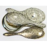 Hallmarked silver mirrors and brushes.