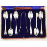 A cased set of hallmarked silver tea spoons and sugar tongs.