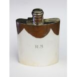 A hallmarked silver hip flask, length 12.5cm, wt. 6oz.