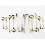 A group of hallmarked silver mustard spoons and sugar tongs, various dates and makers, Georgian