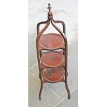 A good quality Edwardian inlaid mahogany cake stand. H98cm.