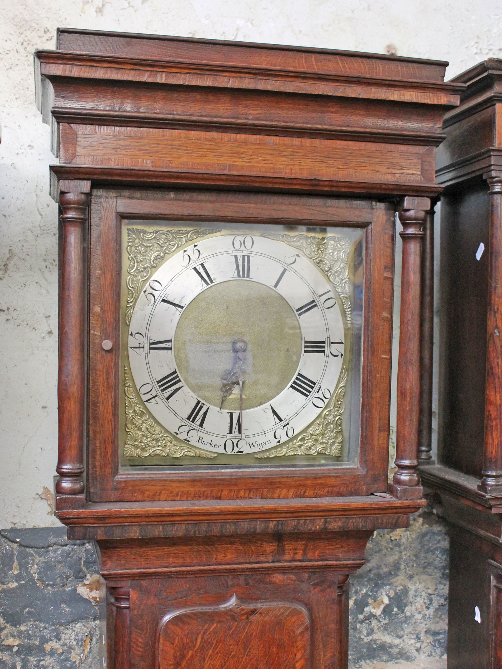 A Georgian oak long case clock the silvered brass dial inscribed 'Baker Wigan'. H210cm. - Image 2 of 2