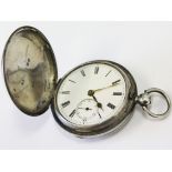 A hallmarked silver full hunter pocket watch, diam. 5cm.