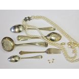 A mixed lot comprising various hallmarked silver cutlery, a pair of stud earrings marked '750' wt.