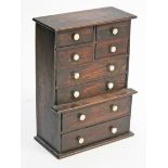 A 19th century "apprentice piece" mahogany chest of drawers. H24.5cm.