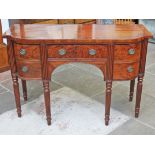 A Regency mahogany sideboard with reeded legs. L143cm D62cm H93cm.