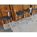 A set of four wrought metal stools designed Frank Guille for Kandya. H87cm.