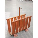 A Japanese bent wood magazine rack labelled 'Yamaguchi'. L45cm.