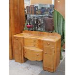 An Art Deco walnut dressing table. W119cm D45cm H155cm.