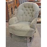 A Victorian upholstered salon chair with rosewood feet. H85cm.