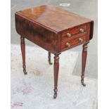 A George IV mahogany four drawer work table circa 1825, having gilt brass knobs stamped