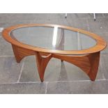 A G-Plan teak and glass top oval coffee table. L122cm.