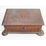 A carved indian box. L40cm.