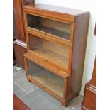 A sectional bookcase. W85cm D35cm H121cm.