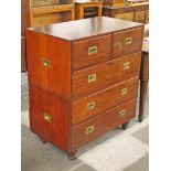 A 19th Century mahogany campaign chest with turned legs and brass handles. W92cm D51cm H104.5cm.