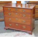 A George III "plum pudding" mahogany mule chest having lift top, three dummy drawers above one lower