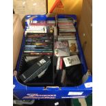 BOX OF CDS AND MUSIC CASSETTES