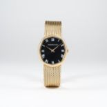 A GENTLEMAN'S 18K SOLID GOLD AUDEMARS PIGUET BRACELET WATCH CIRCA 1970s 
D: Black dial with white