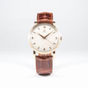 A GENTLEMAN'S LARGE SIZE 18K SOLID GOLD OMEGA WRIST WATCH CIRCA 1950s
D: Silver dial with gilt
