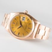 A RARE GENTLEMAN'S 18K SOLID PINK GOLD ROLEX OYSTER PERPETUAL DATE BRACELET WATCH CIRCA 1960, REF.