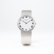 A FINE GENTLEMAN'S 18K SOLID WHITE GOLD PATEK PHILIPPE CALATRAVA BRACELET WATCH CIRCA 1990, REF.