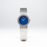 A FINE LADIES 18K SOLID WHITE GOLD CHOPARD BRACELET WATCH CIRCA 1970s
D: Lapis lazuli dial. M: 17