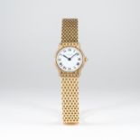 A FINE LADIES 18K SOLID GOLD & DIAMOND CARTIER BRACELET WATCH CIRCA 1990
D: White dial with black