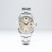 A RARE GENTLEMAN'S STAINLESS STEEL ROLEX OYSTER PERPETUAL DATE BRACELET WATCH CIRCA 1970, REF.