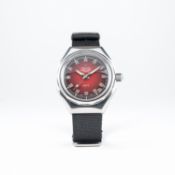 A GENTLEMAN'S STAINLESS STEEL ZENITH DEFY AUTOMATIC DIVERS WRIST WATCH CIRCA 1970 
D: Red "smoke"