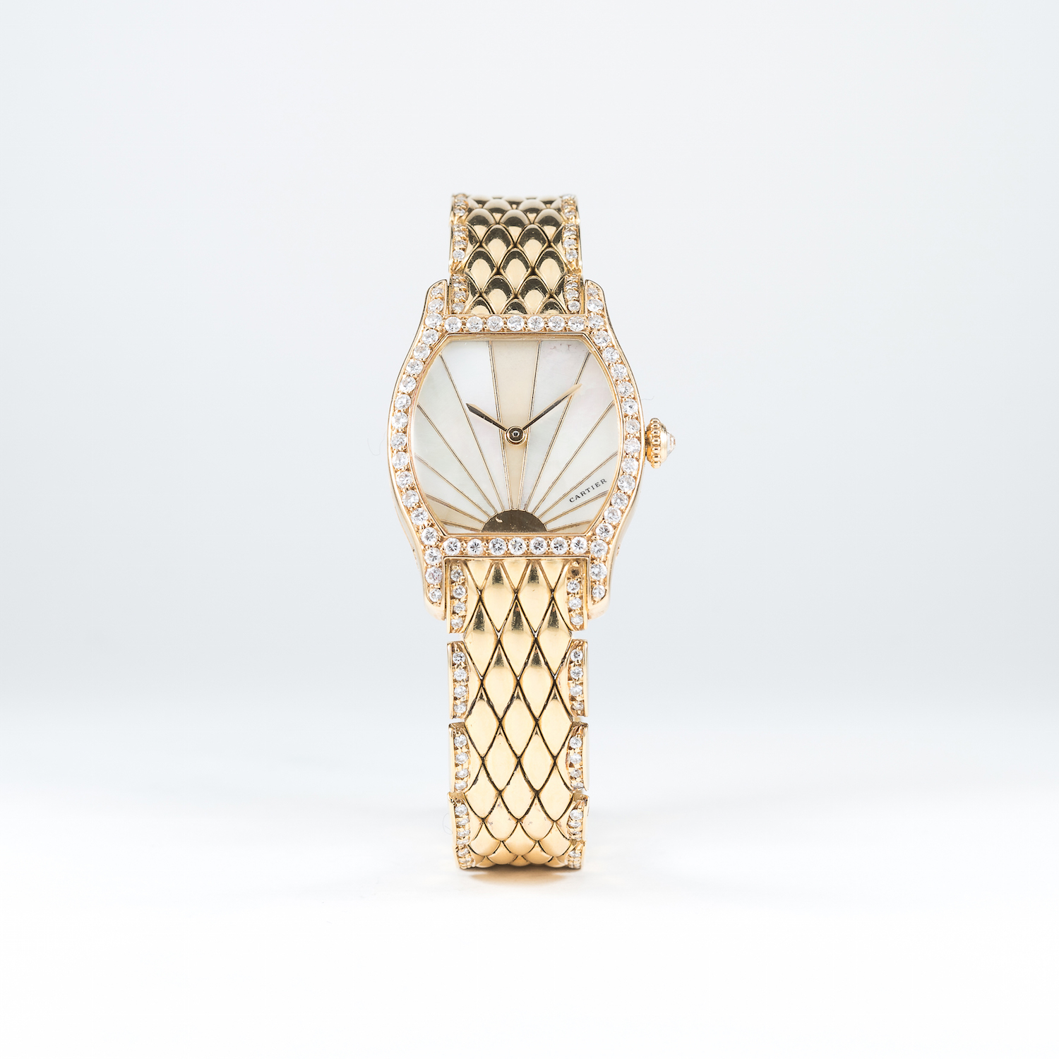 A FINE & RARE LADIES 18K SOLID GOLD & DIAMOND CARTIER TORTUE BRACELET WATCH CIRCA 2000
D: Mother