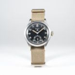 A RARE GENTLEMAN'S STAINLESS STEEL BRITISH MILITARY W.W.W. GRANA WRIST WATCH CIRCA 1940s 
D: Black