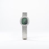 A FINE & RARE LADIES 18K SOLID WHITE GOLD & DIAMOND AUDEMARS PIGUET BRACELET WATCH CIRCA 1970s 
D: