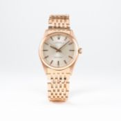 A RARE GENTLEMAN'S 18K SOLID PINK GOLD ROLEX OYSTER PERPETUAL BRACELET WATCH CIRCA 1960s, REF.