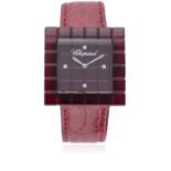 A LADIES CHOPARD BE MAD WRIST WATCH CIRCA 2000, REF. 12/7780 D: Red resin dial with quarterly