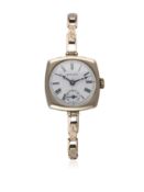 A LADIES 9CT SOLID GOLD ROLEX BRACELET WATCH CIRCA 1920s D: White enamel dial with Roman numerals,