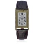 A FINE & RARE GENTLEMAN'S 18K SOLID GOLD & DIAMOND CARTIER TANK BASCULANTE WRIST WATCH CIRCA