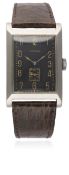 A GENTLEMAN'S OVERSIZE STAINLESS STEEL CASED LONGINES RECTANGULAR WRIST WATCH CIRCA 1941  D: Black